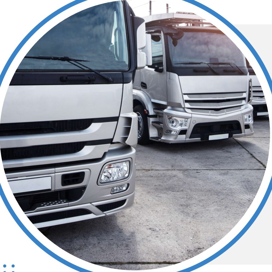 Row of Bab Al Bahrain trucks parked on site